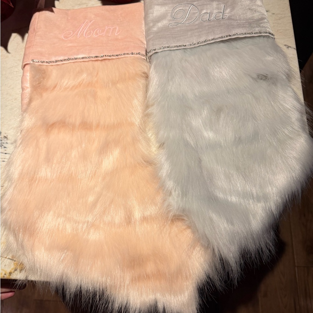 Pottery Barn Monique Lhullier fur stocking engraved with mom and dad.